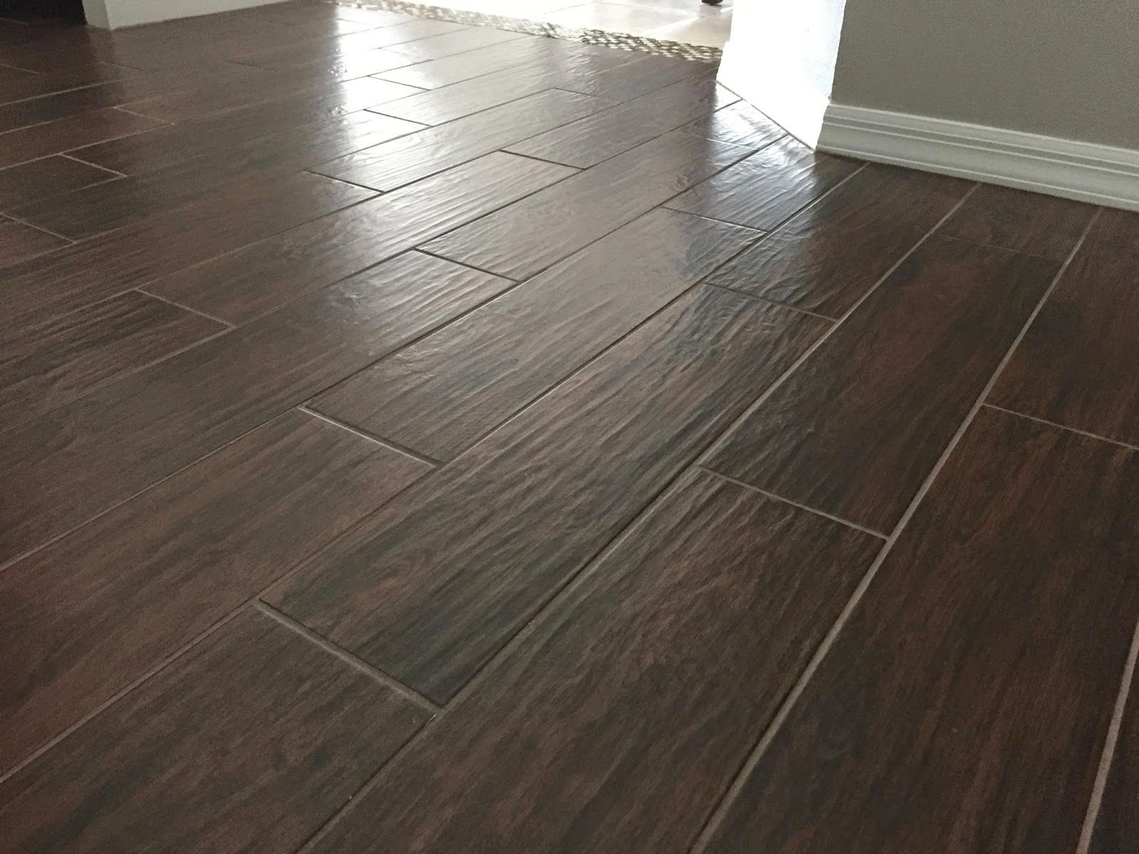 modern kitchen with light wood looking porcelain tiles